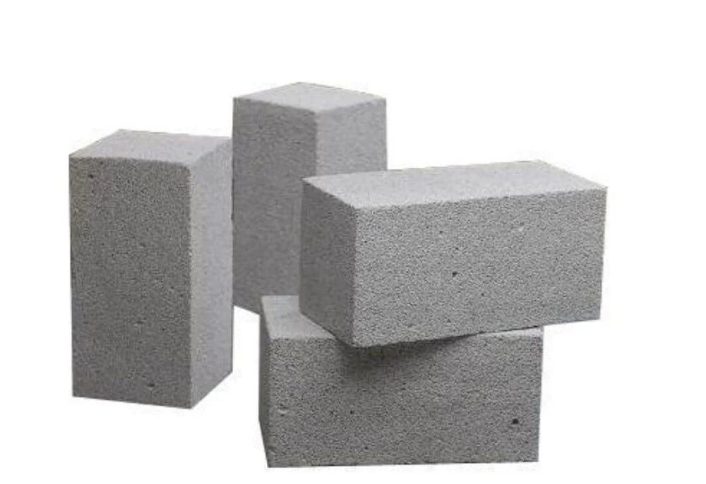 Stack of grey fly ash bricks